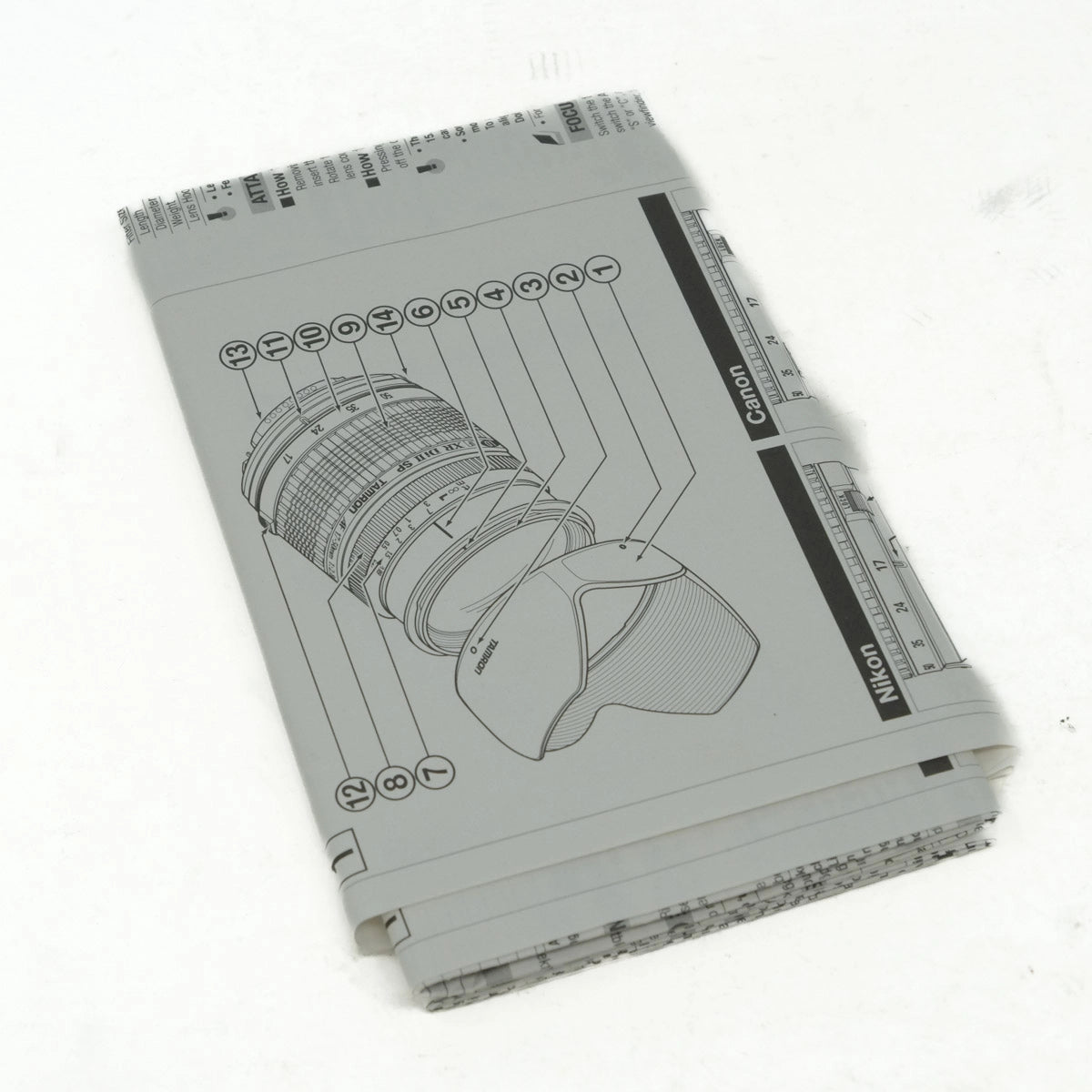 Notebook with camera lens design on a white background
