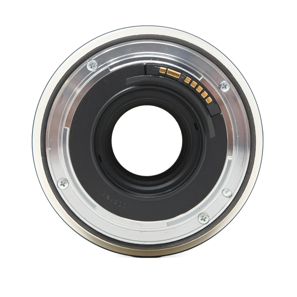 A close-up studio shot of a camera lens adapter ring, showing the metallic silver outer ring, black internal elements, and gold-colored contact pins on a plain white background.
