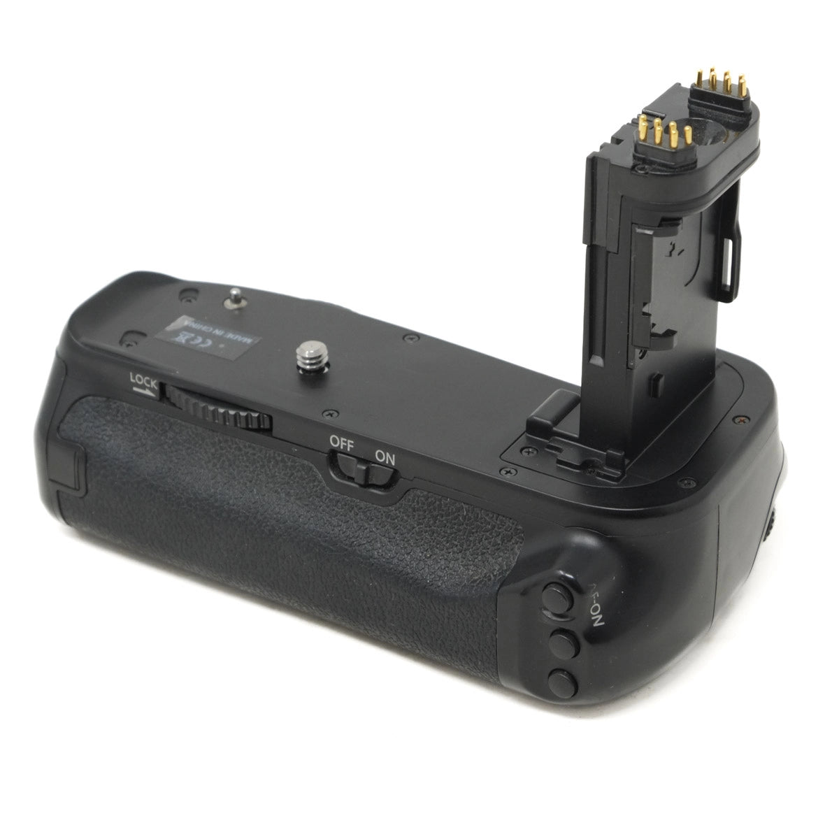 Camera battery grip on a white background