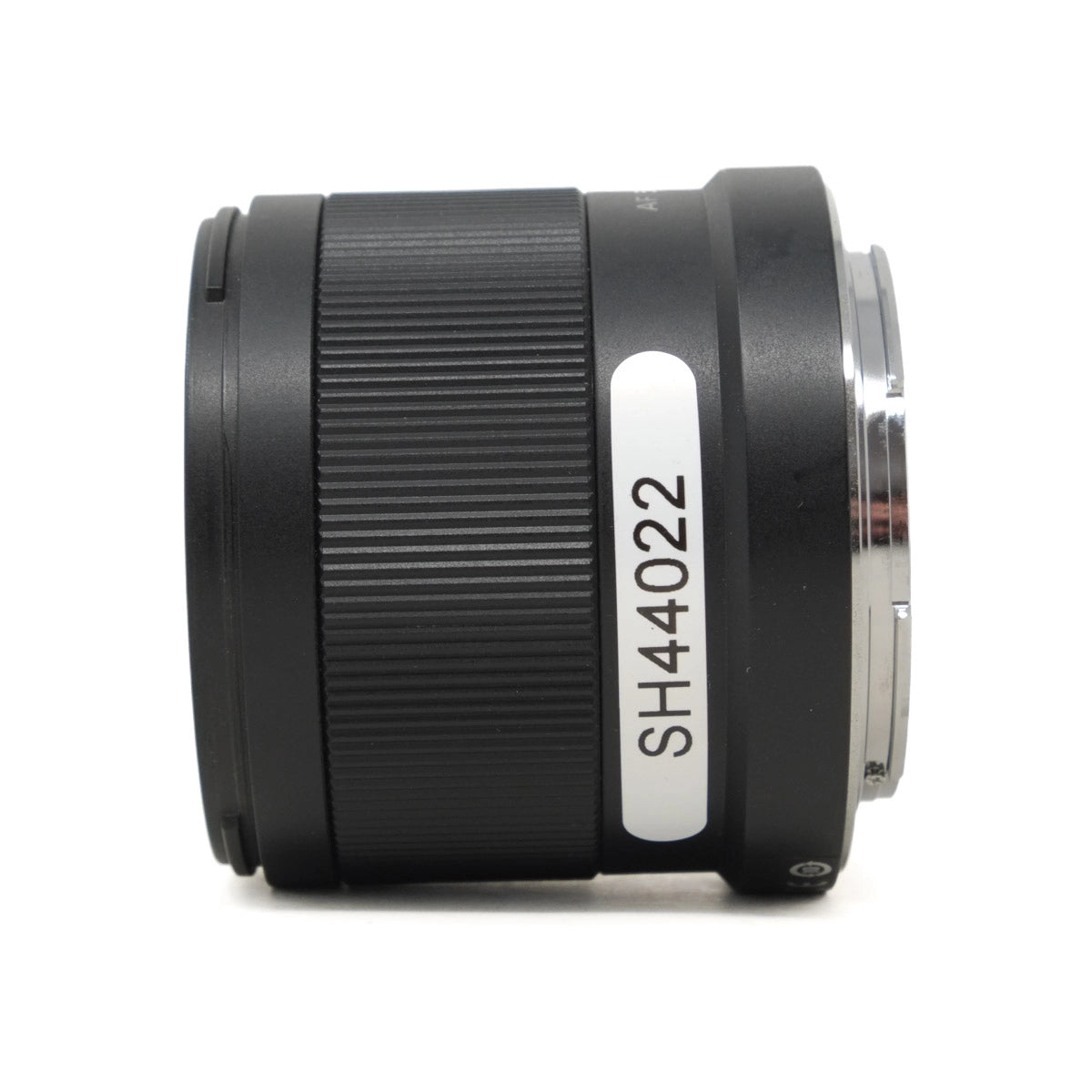 Camera lens with 'SH44022' marking on a white background