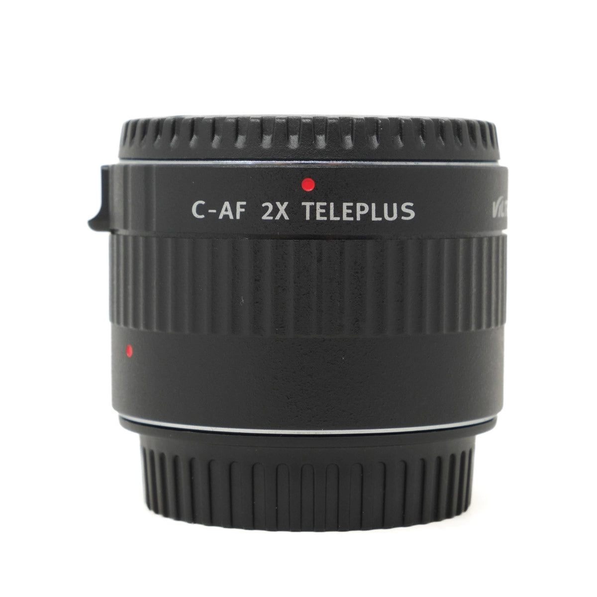 Camera lens converter with 'C-AF 2X TELEPLUS' text on a white background