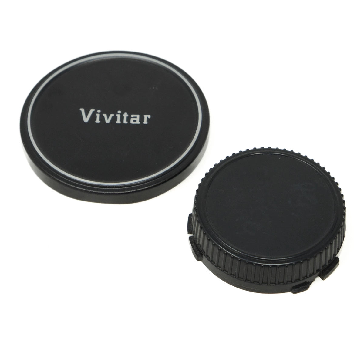Two camera lens caps with 'Vivitar' branding on a white background
