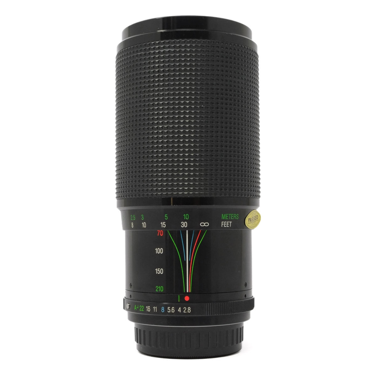 Black camera lens with focus scale on a white background