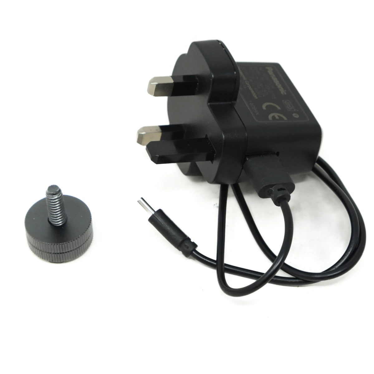 Black power adapter with plug and cable on a white background