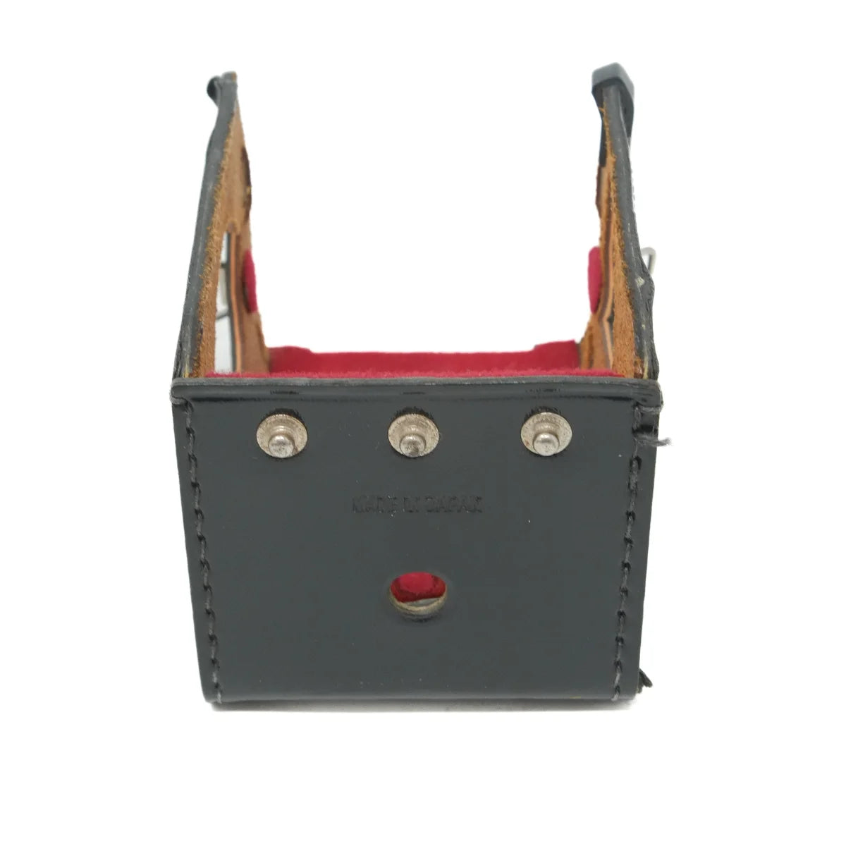 A vintage dark gray leather camera pouch with a red velvet lining and silver-tone metal studs, shown against a plain white background.