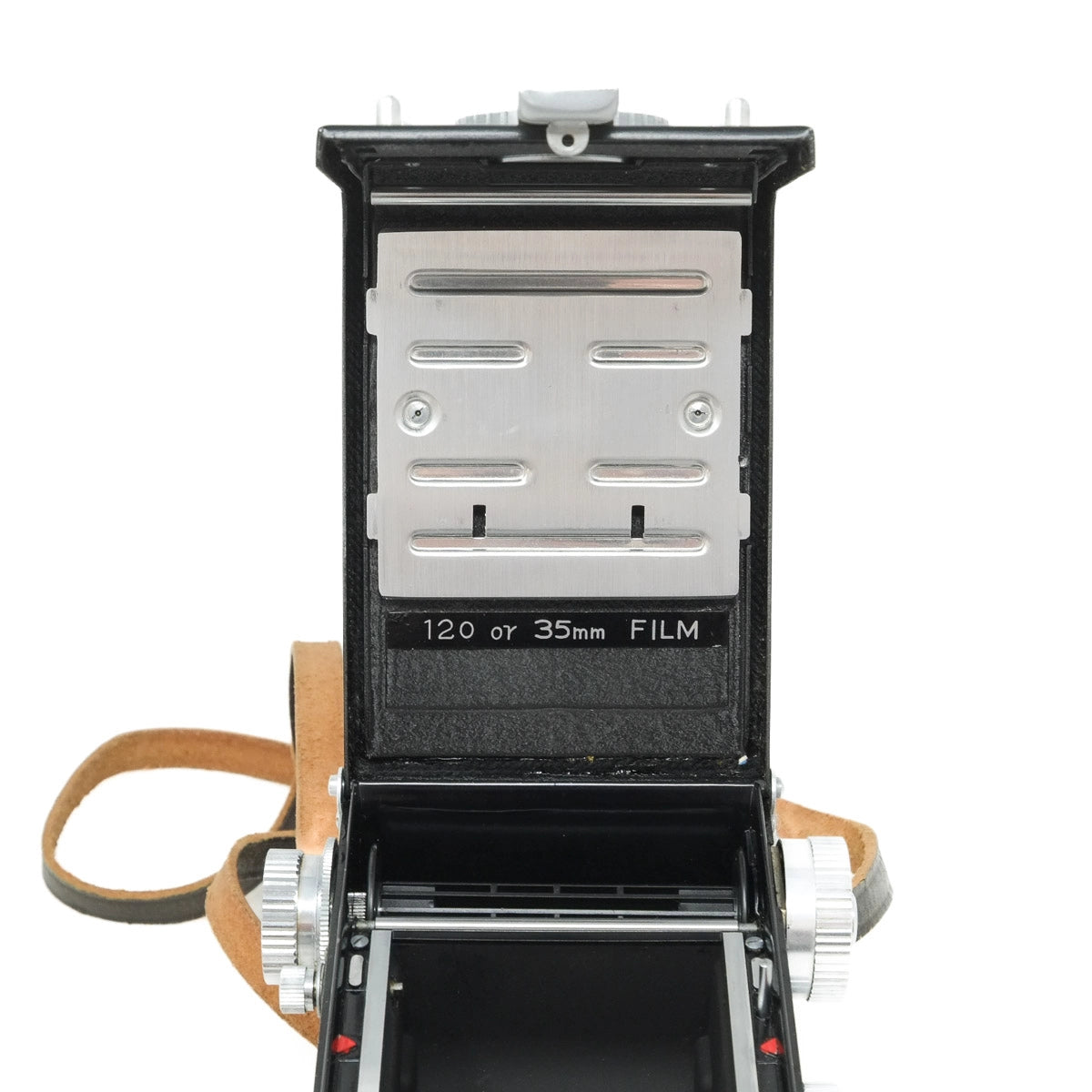Vintage camera with open film compartment on a white background