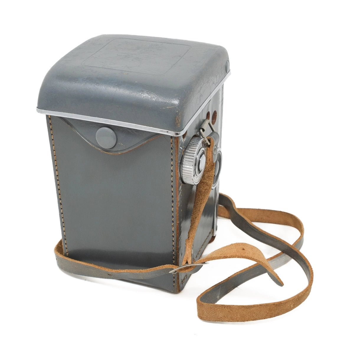 Vintage camera with a brown leather strap on a white background