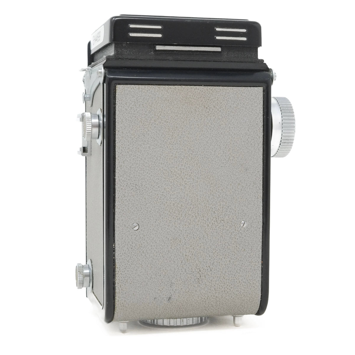 Vintage camera with a metallic finish on a white background