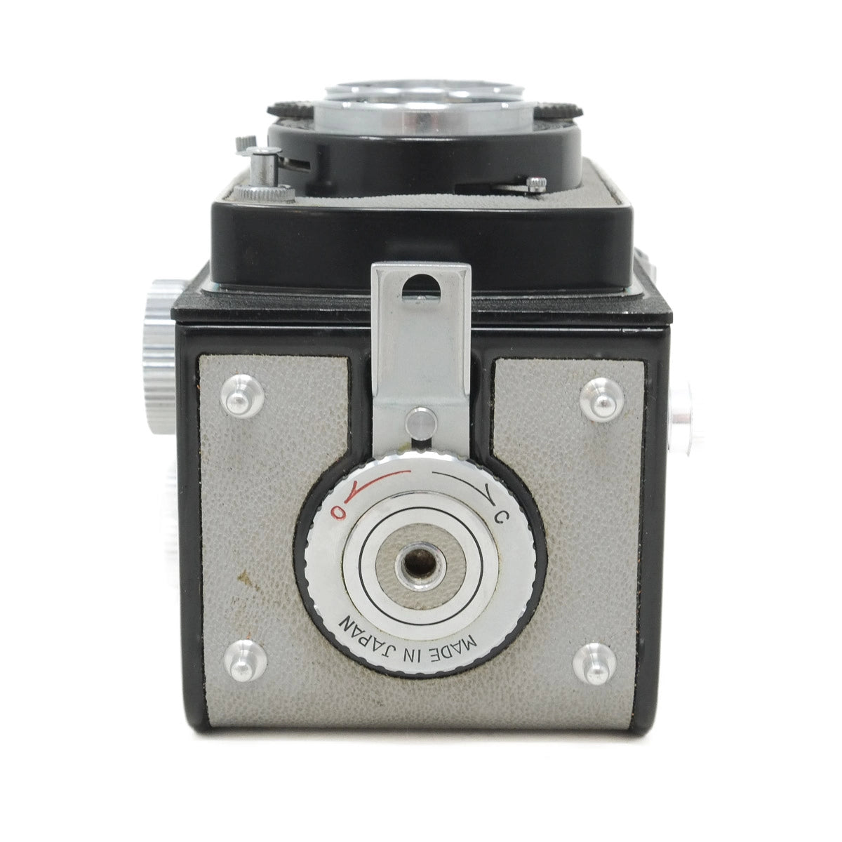 Vintage camera with metallic finish on a white background