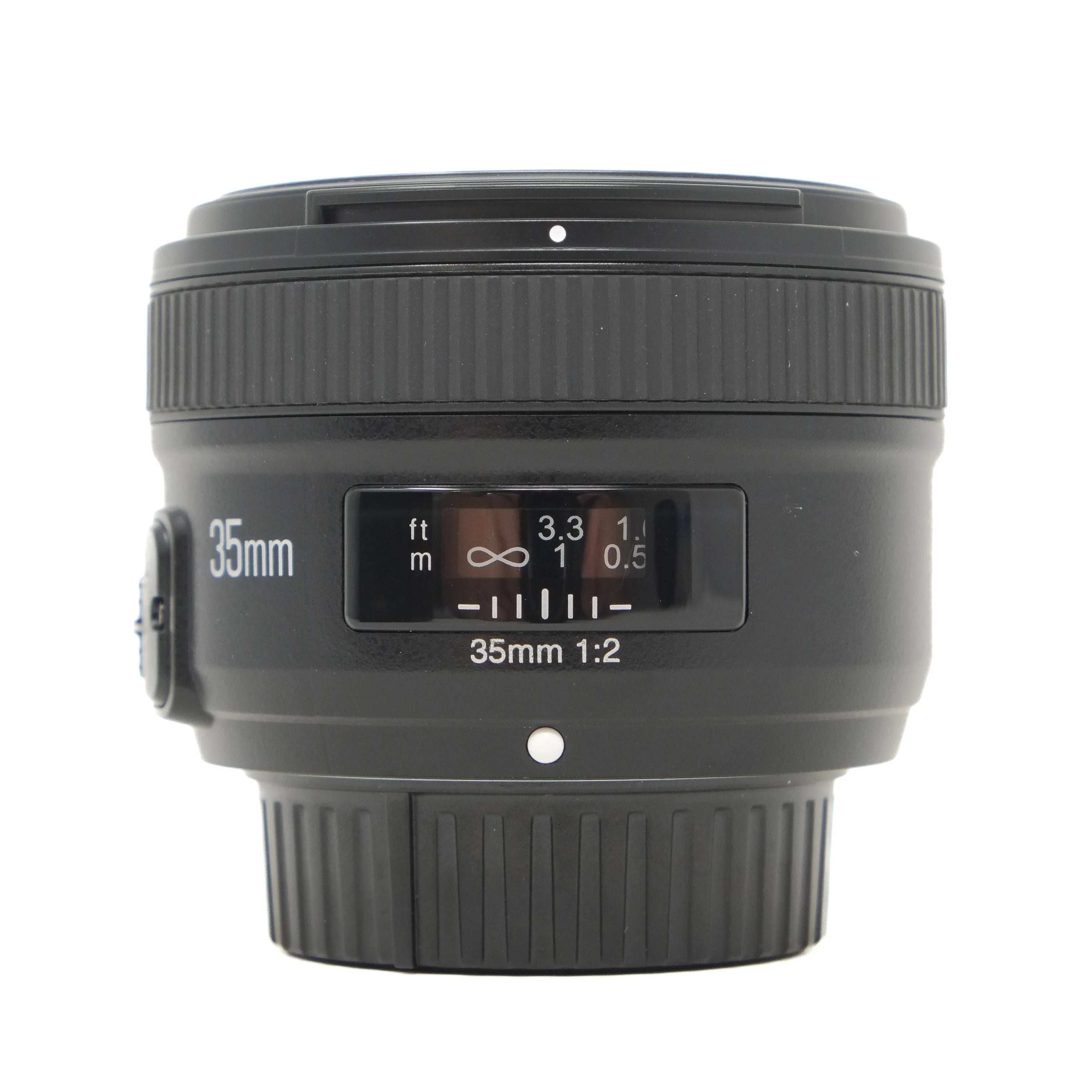 Camera lens with focus scale and text on a white background