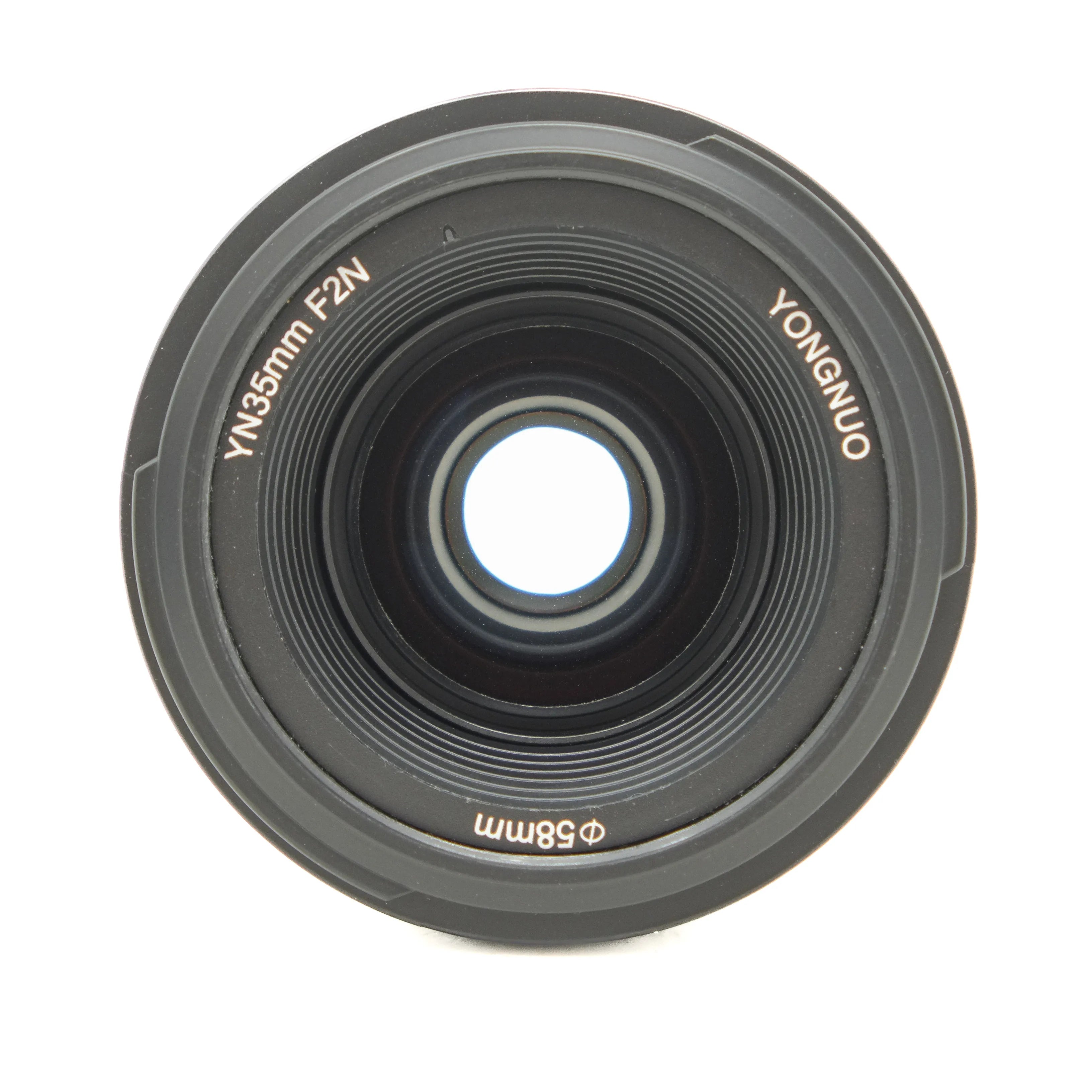Camera lens with 'Yongnuo' branding on a white background