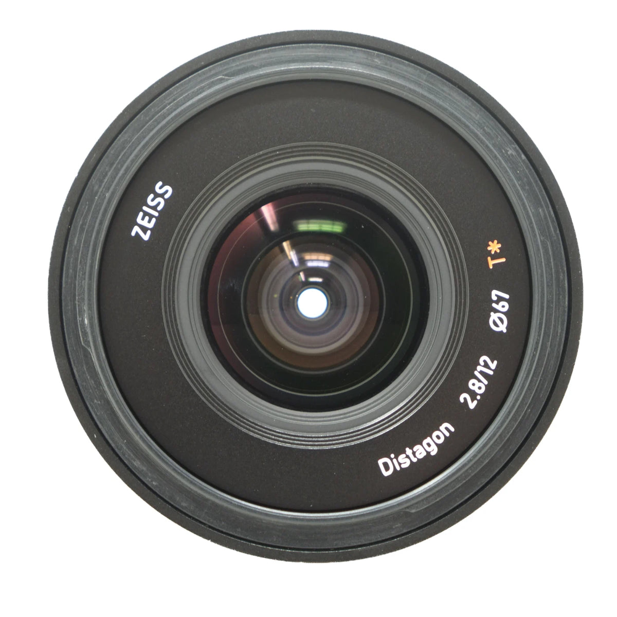 A front-facing view of a Zeiss Distagon 2.8/12 f/1.87 camera lens on a solid white background.