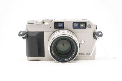 Used Contax G1 with 45mm f2 with Filters , strap and book