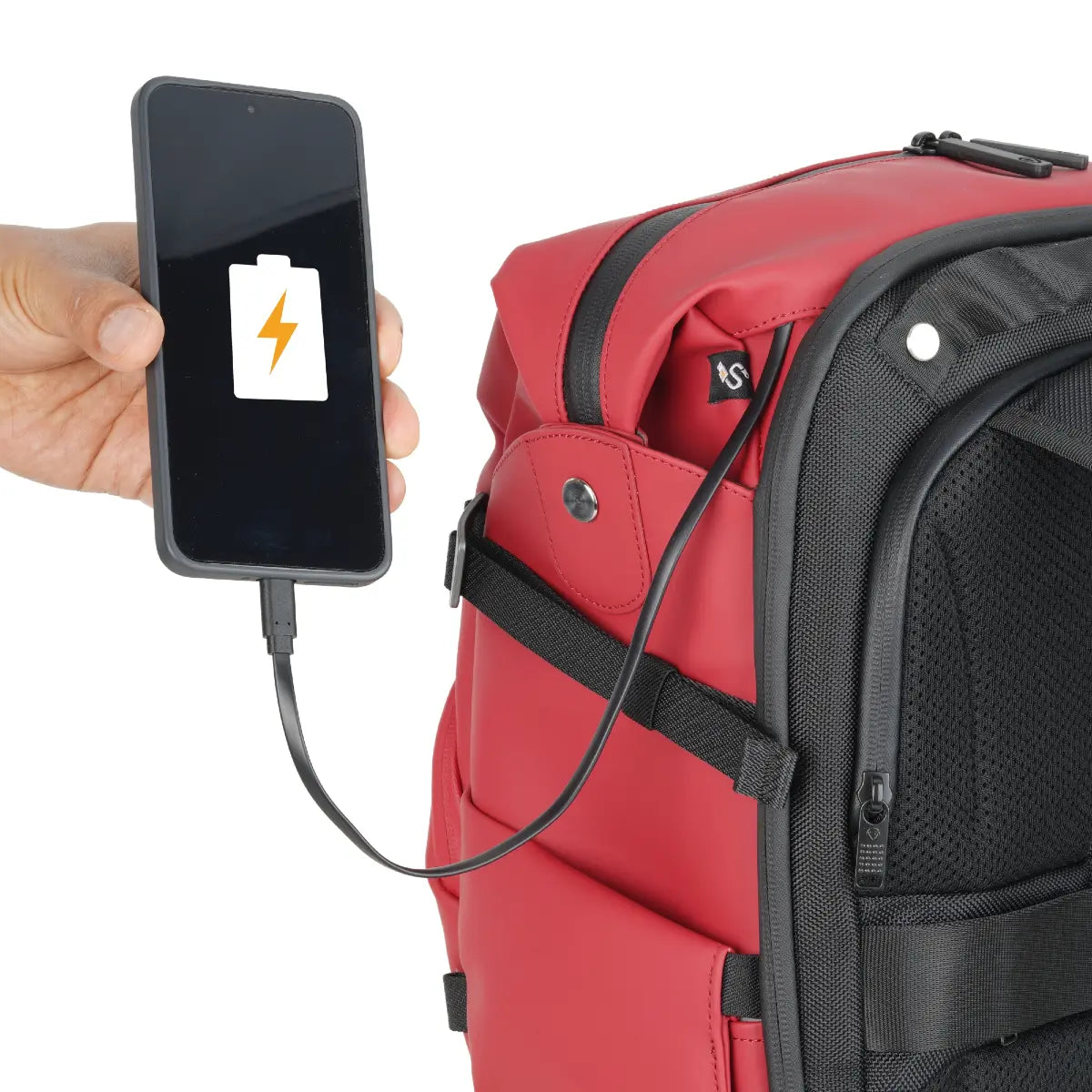 Red backpack with a charging cable connected to a smartphone displaying a battery icon.