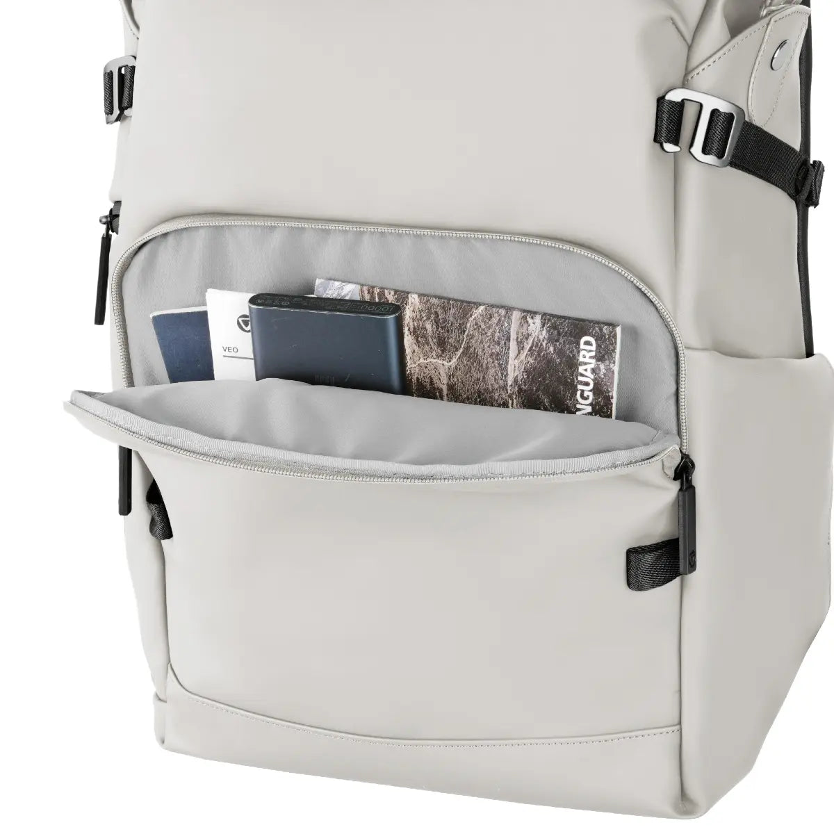 Light gray backpack with open front pocket showing items inside on a white background