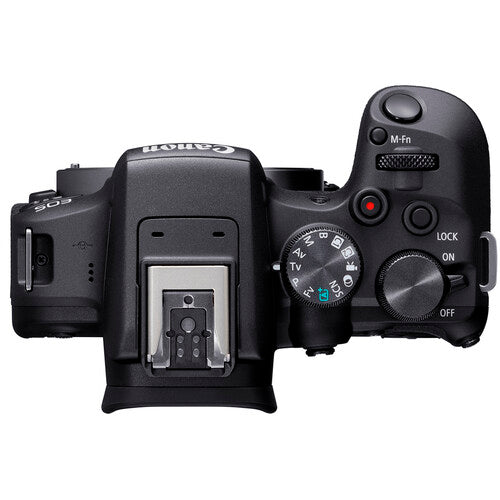 Canon EOS R10 Mirrorless Camera + RF-S 18-150mm F3.5-6.3 IS STM Lens Kit - Product Photo 6 - Top down view of the camera showing the flash port mount, control dial and camera controls